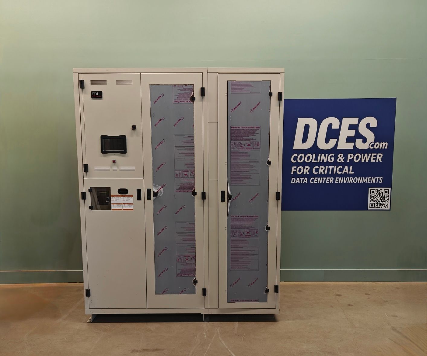 A large, beige cabinet with two glass doors and a side panel. DCES.com banner on right.