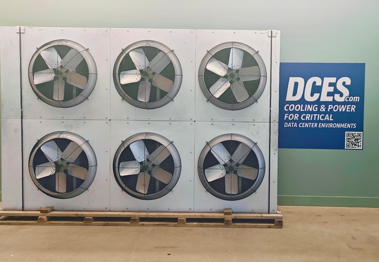Six industrial fans in a white panel, blue logo on the right.