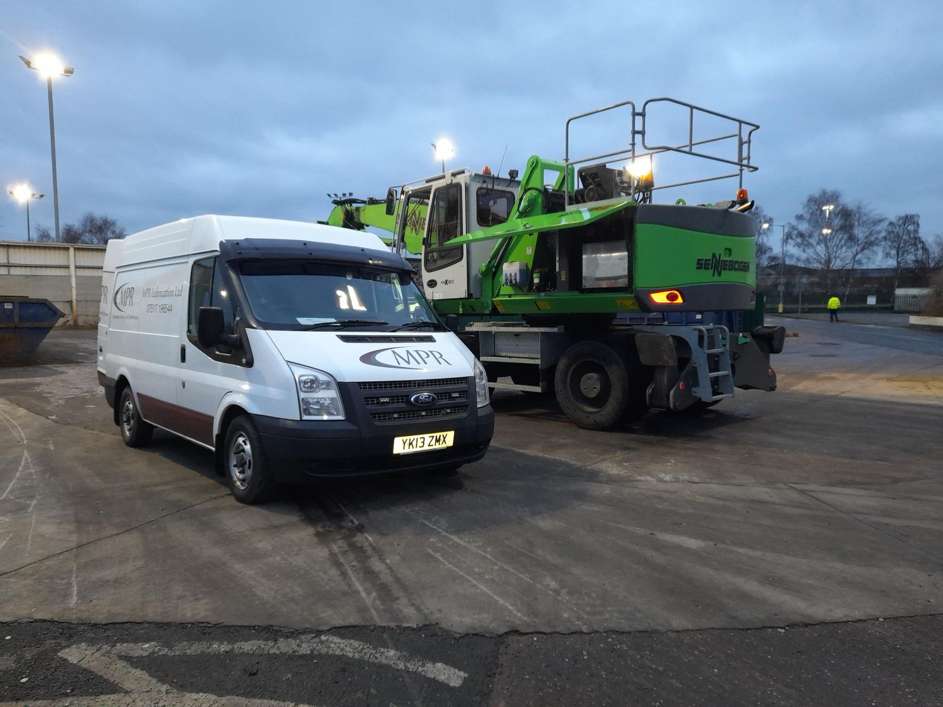 mk2 l2h2 signwritten transit van next to green sennebogen machine