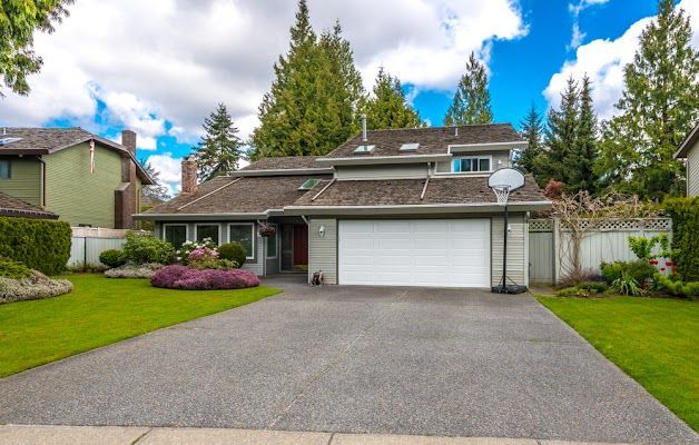 A House With A Basketball Hoop In Front Of It  — River2Coast Concreting in Boambee, NSW
