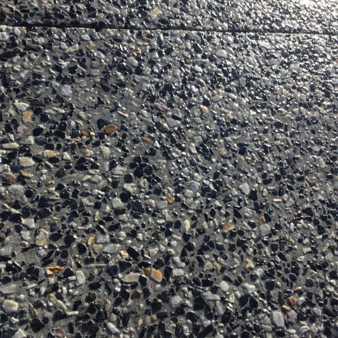 A Close Up Of A Gray And Black Concrete Surface  — River2Coast Concreting in Boambee, NSW