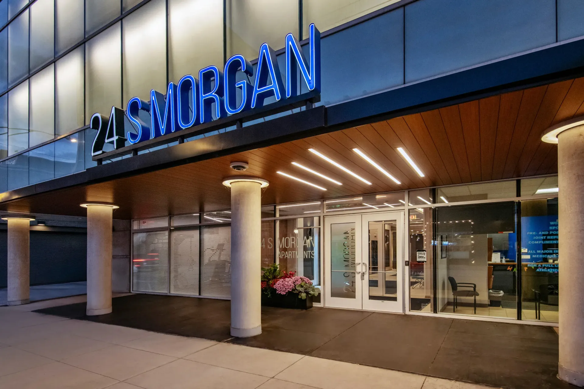 The front of a building with a sign that says