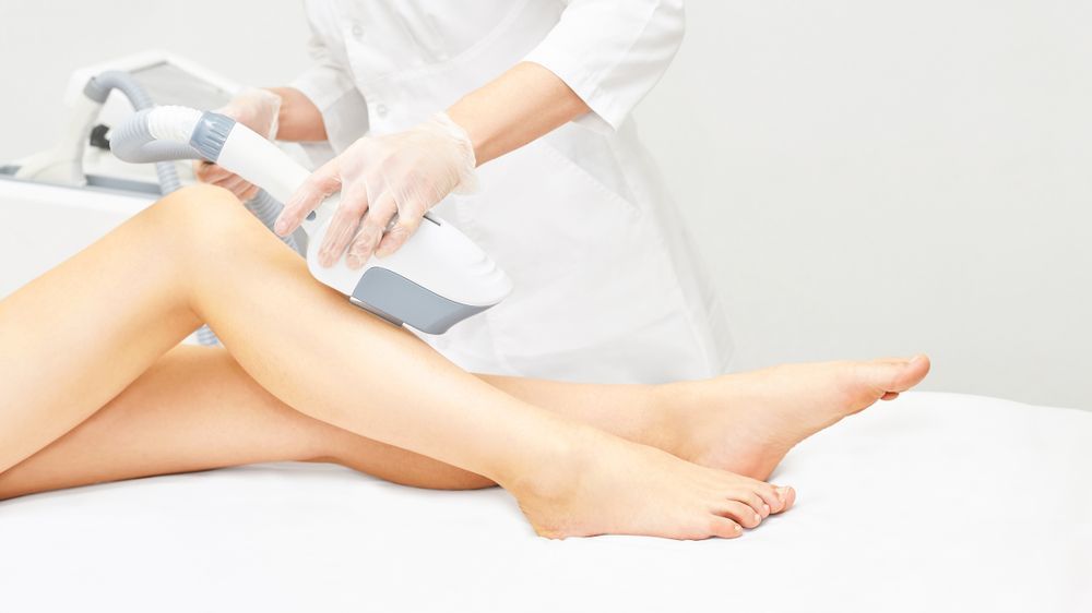 Person receiving laser hair removal on legs — HealthPoint Mingara In Tumbi Umbi, NSW