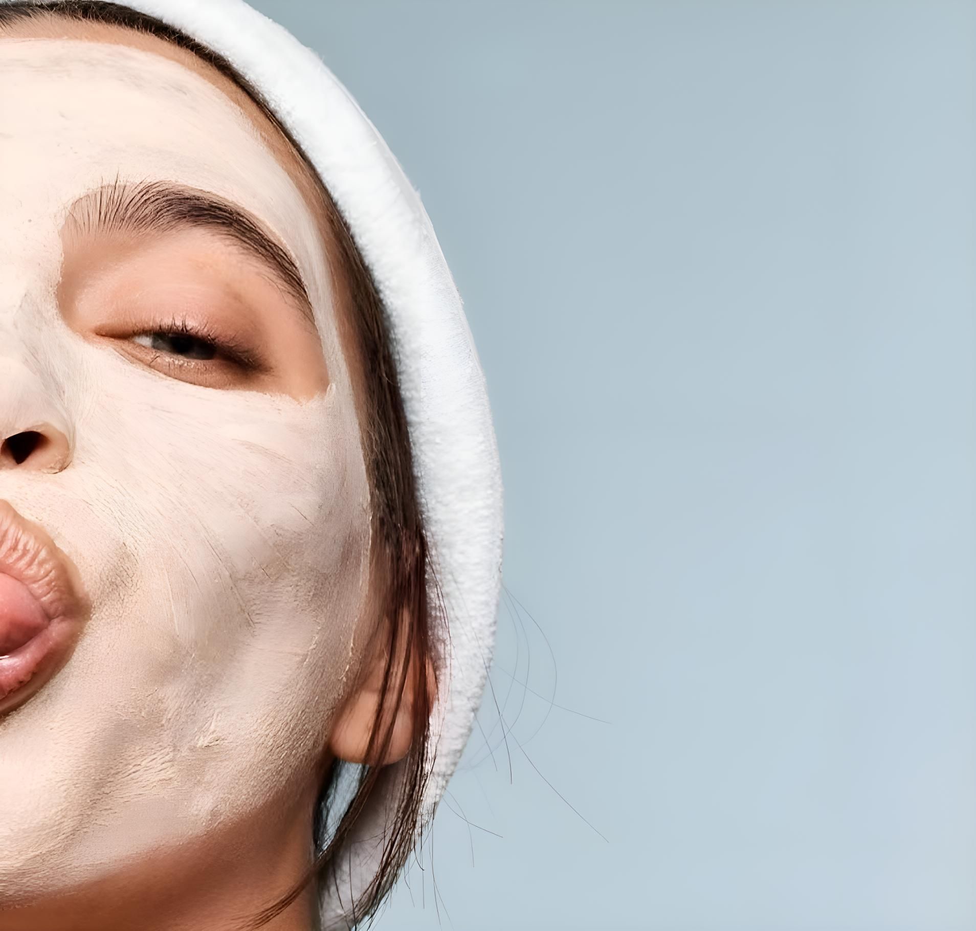 A Woman With A White Mask On Her Face Is Sticking Her Tongue Out — HealthPoint Mingara In Tumbi Umbi, NSW