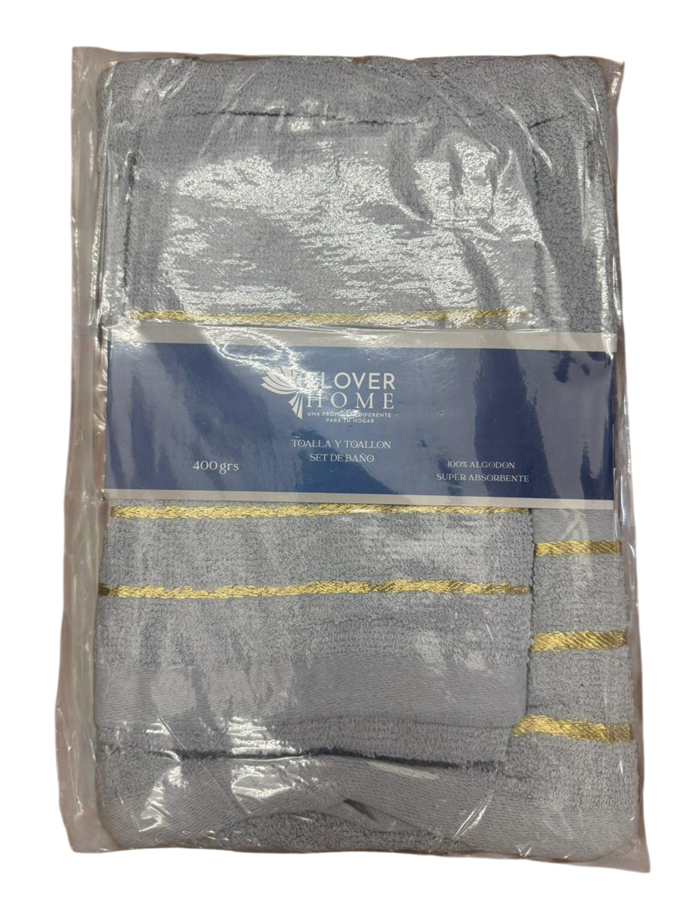 Una manta decorativa gris de la marca Clover Home