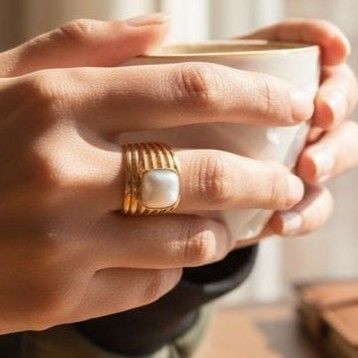 Anillo Acero Dorado Perla OAN74