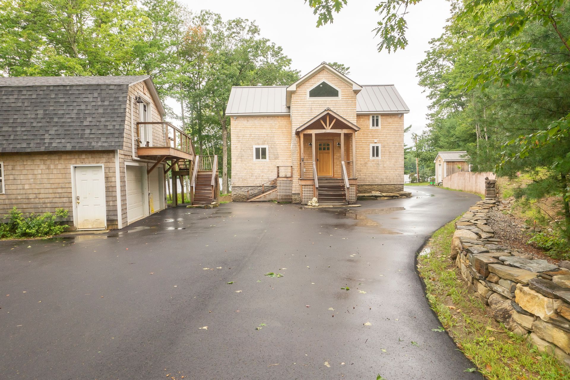 A large house with a driveway leading to it