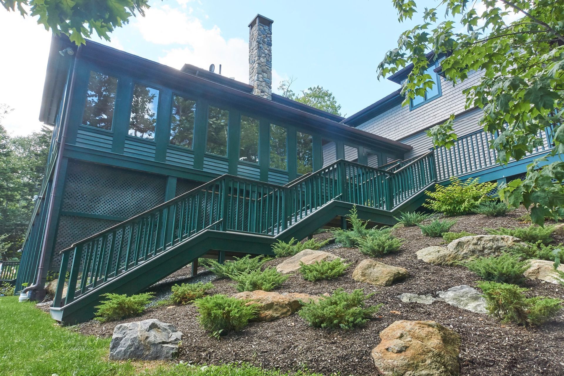 A house with stairs leading up to the second floor