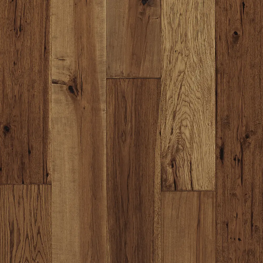 A close up of a wooden floor with a grain and texture.