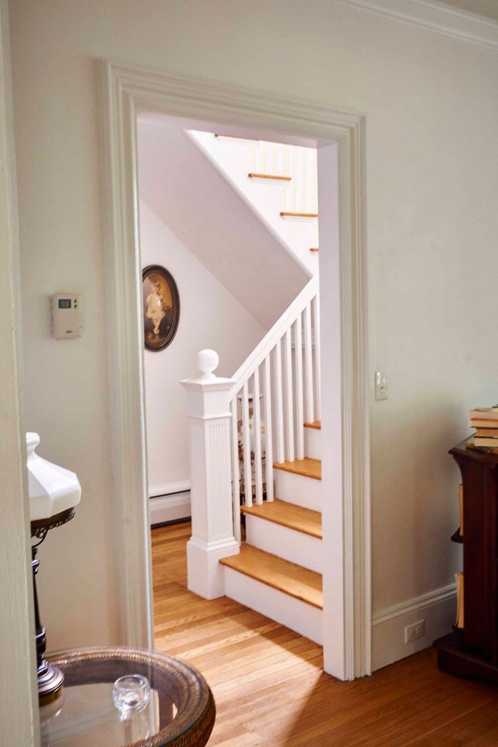 A doorway leading to a staircase in a house