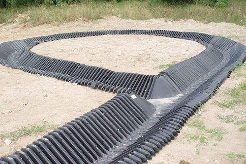 Whitecap Builders installed underground drainage and erosion control piping in Searsmont, Maine.