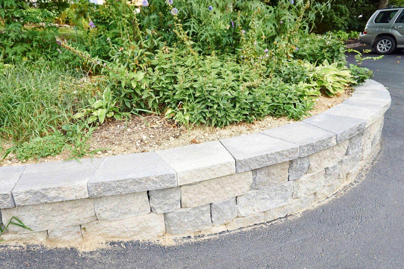 Whitecap Builders created a raised planting bed using concrete blocks in Northport, Maine.