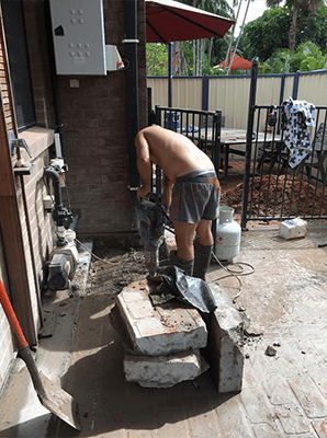 Plumber fixing leaking water pipe - Plumber in Darwin, NT