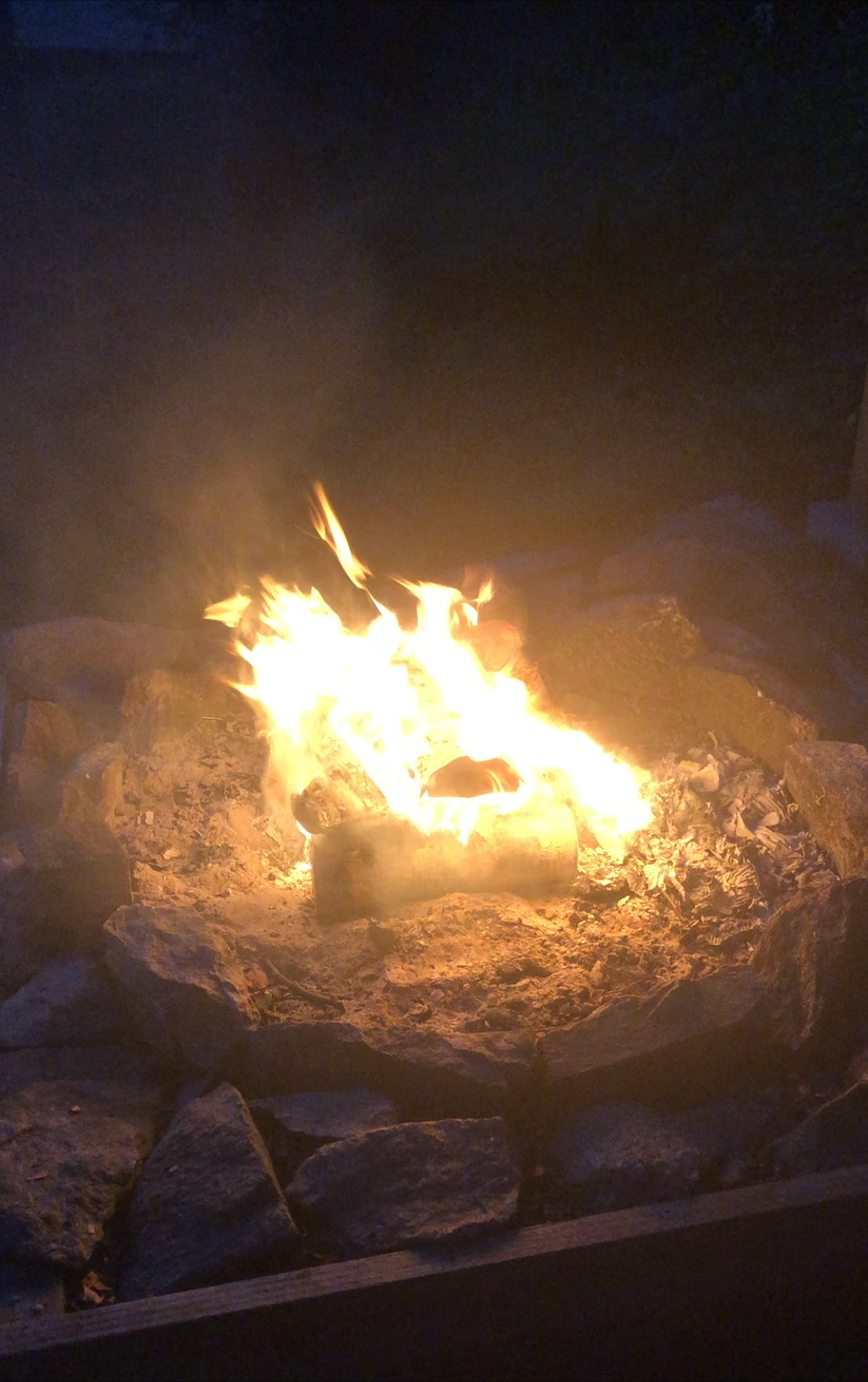 A campfire at night