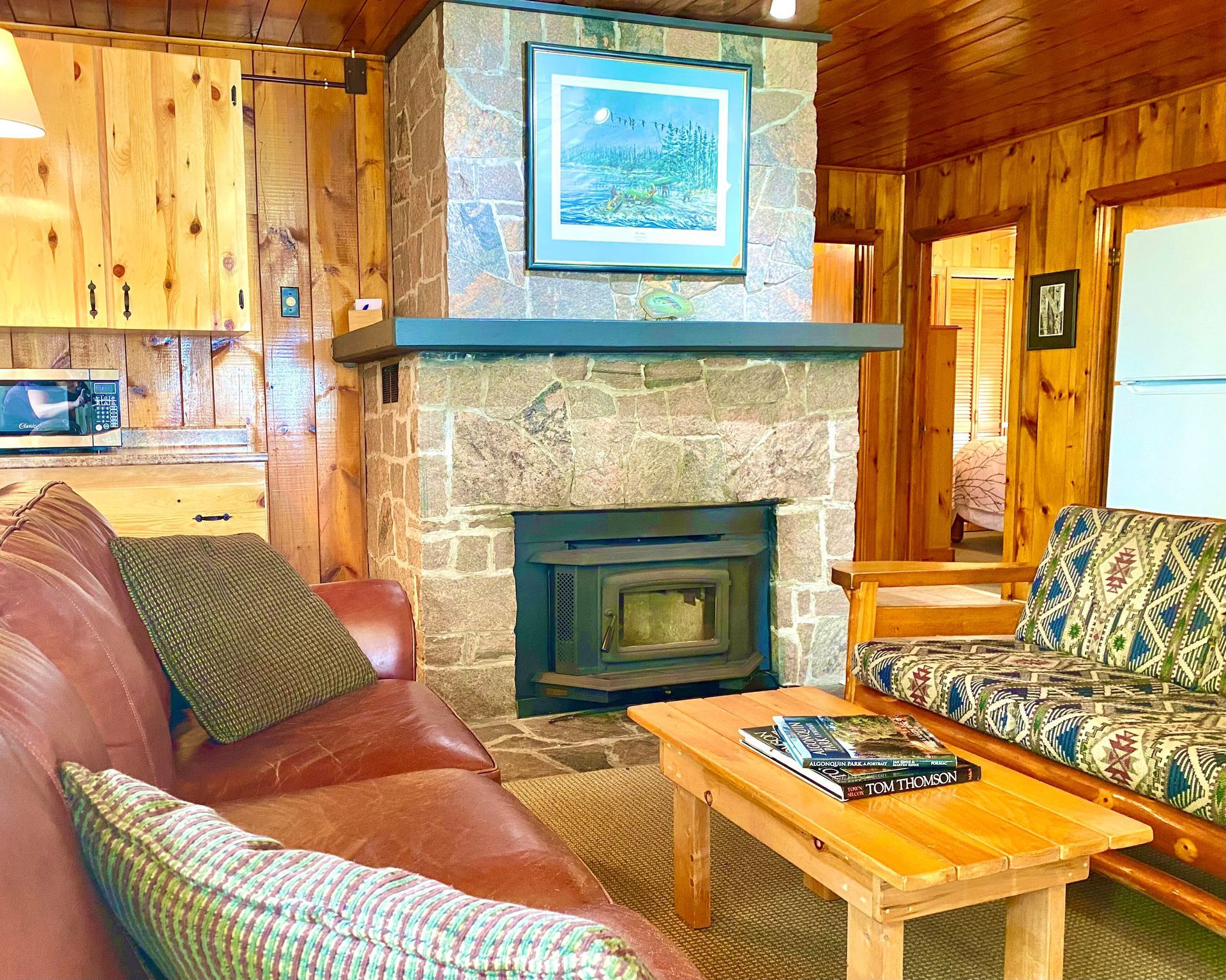 White Pine cottage living room with a fireplace and a couch