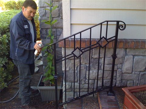 Man Cleaning Stair Rail — Mellman & Perdue CPAs — Oakland, CA