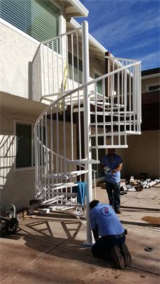 Two Man Working Under Curve Stair — Mellman & Perdue CPAs — Oakland, CA