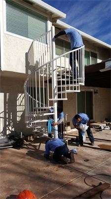 Three Man Working Under Curve Stair — Mellman & Perdue CPAs — Oakland, CA