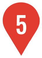 A red pin with the number five on it.