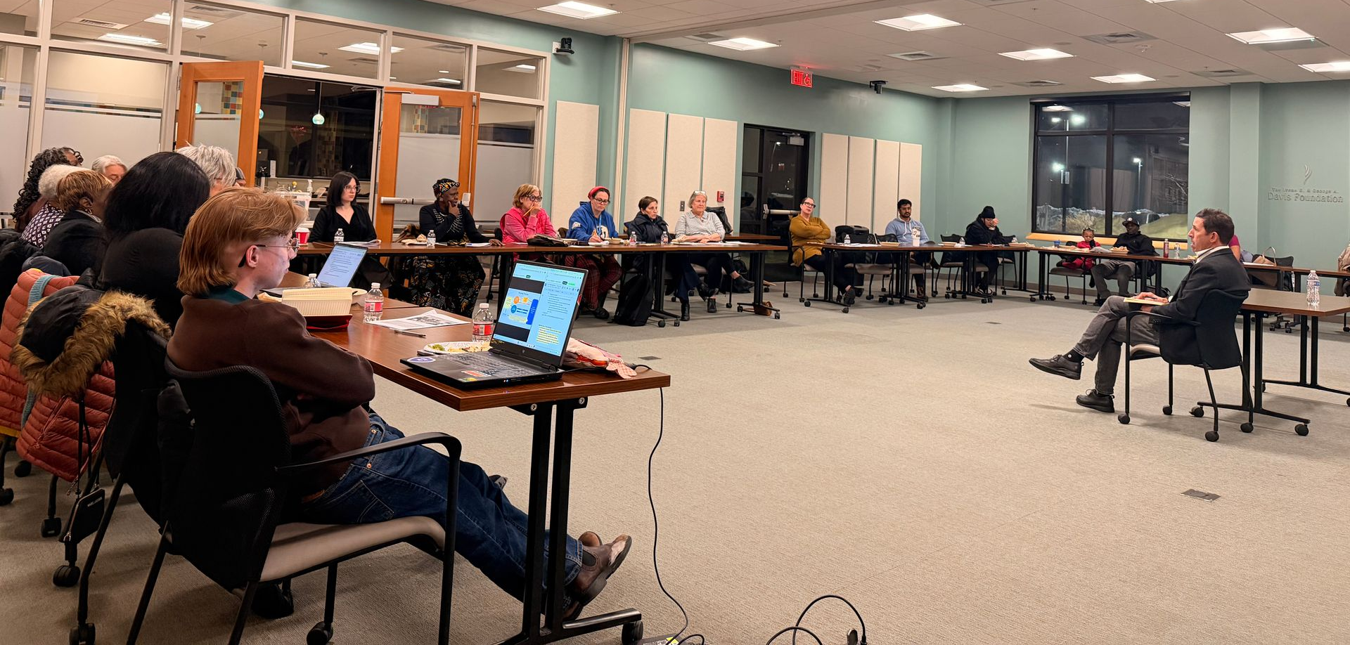 TCI Springfield Resident advisory Committee listening to Charles Buki of CZB present on SPringfield's housing market