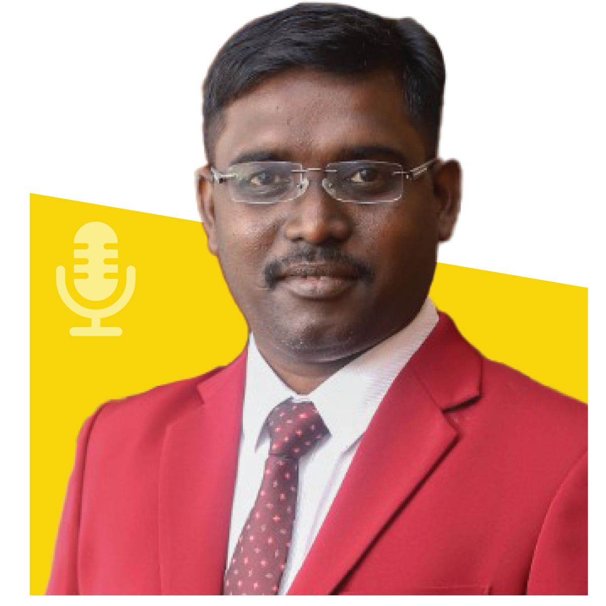 A man wearing glasses and a red suit, positioned in front of a yellow backdrop, with a microphone icon.