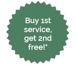 A green sticker that says buy 1st service get second FREE!*