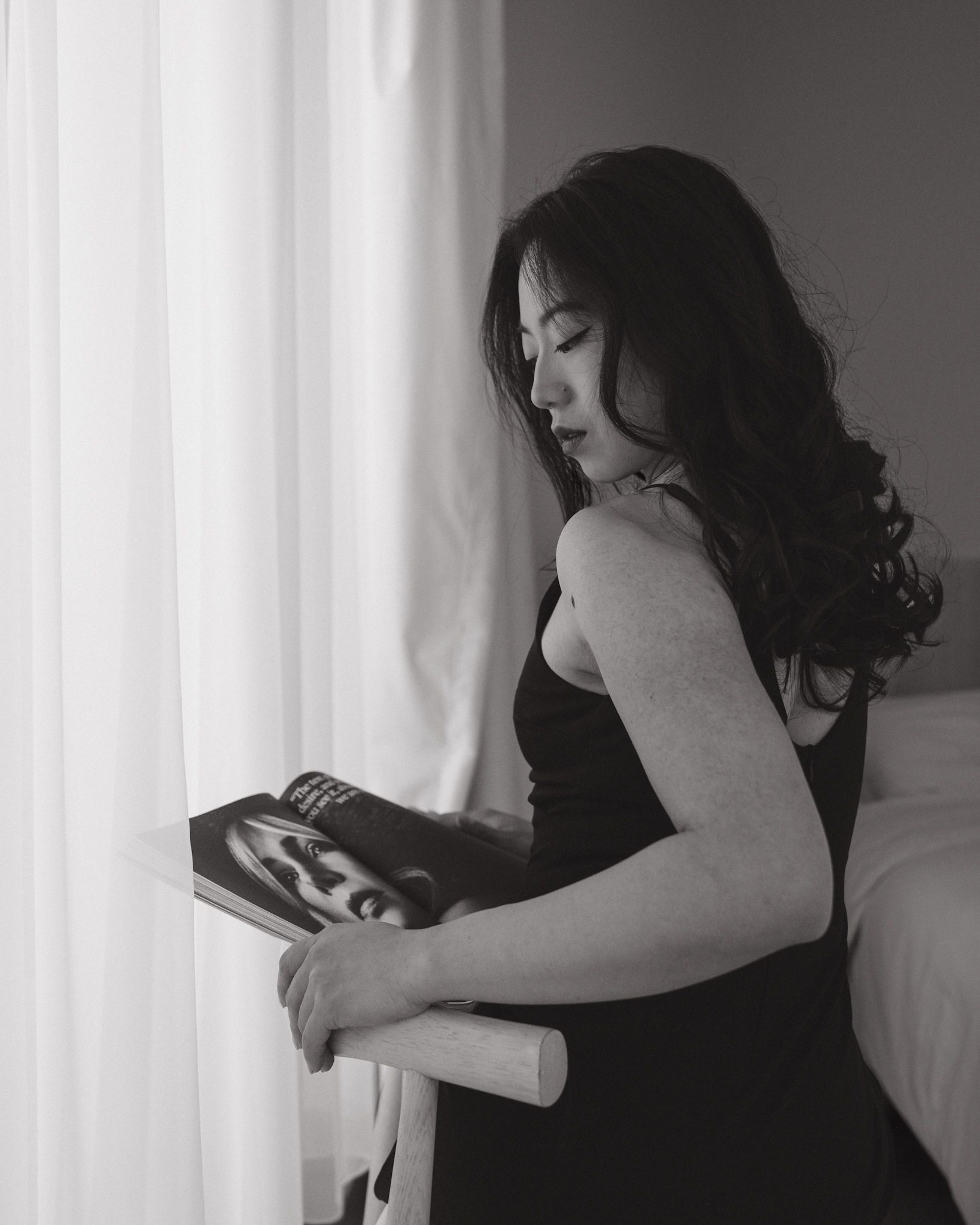 Fashion hotel lifestyle editorial portrait with cinematic composition in black and white