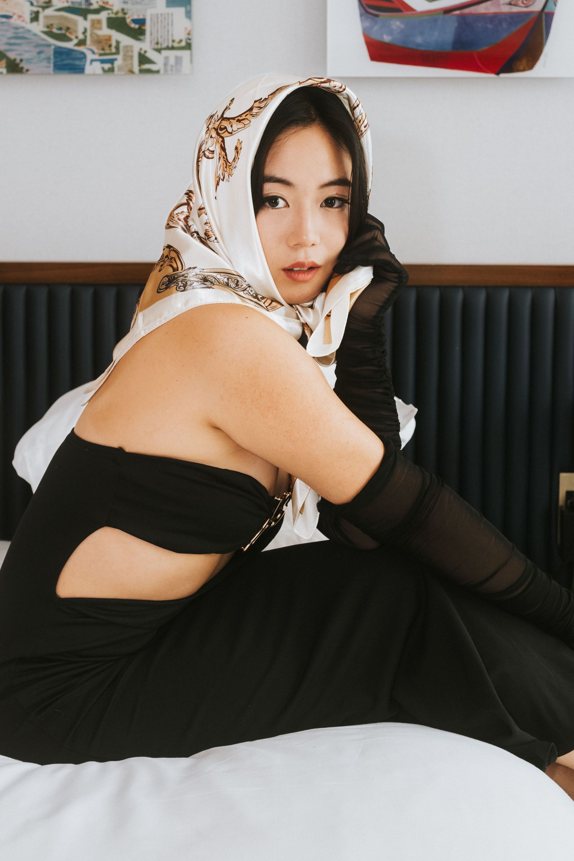 Luxury fashion editorial at the TWA Hotel, retro Hollywood narrative and controlled performance, model Minnie Lee — campaign-ready.