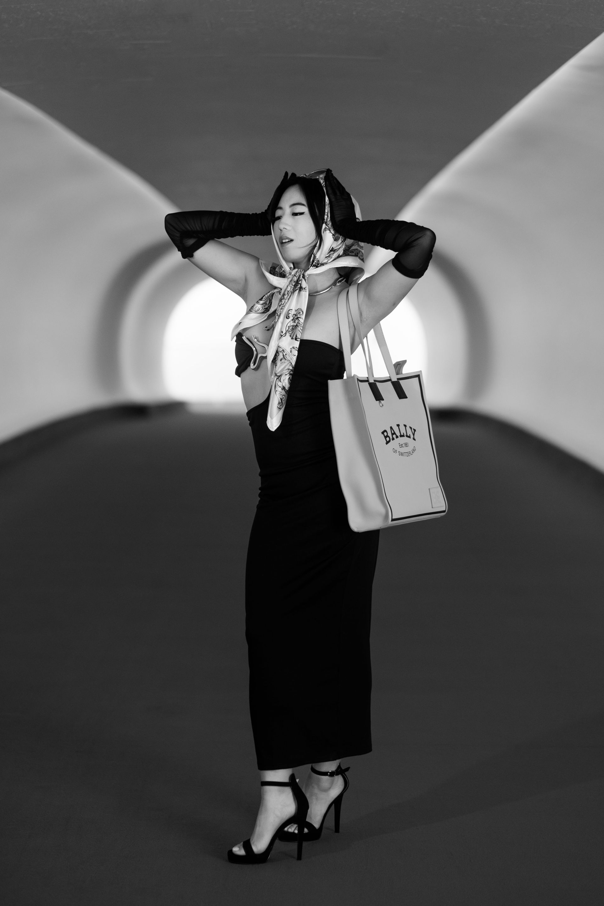 Retro Hollywood-inspired editorial at TWA Hotel, commanding presence and luxury tone — model Minnie Lee.