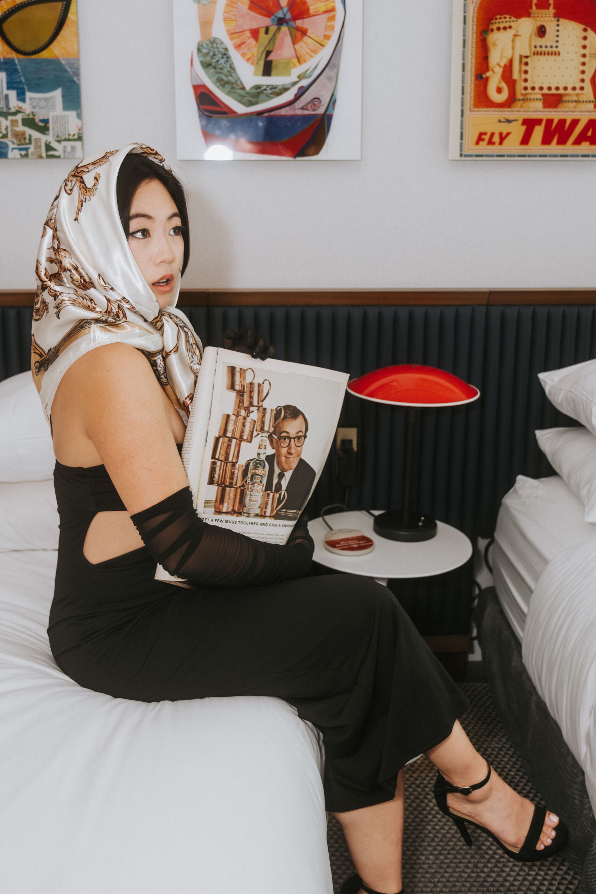 Luxury fashion editorial at the TWA Hotel, retro Hollywood narrative and controlled performance, model Minnie Lee — campaign-ready.