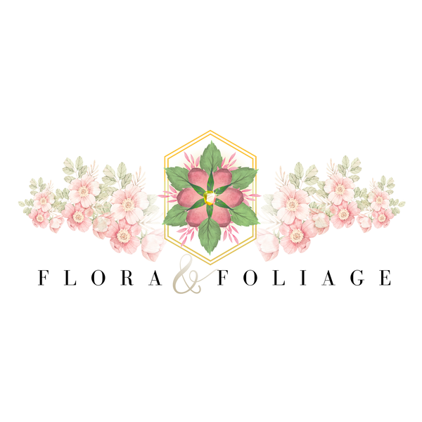 Logo for "Flora & Foliage" featuring a gold hexagon frame enclosing a floral mandala, flanked by pink flower bouquets.