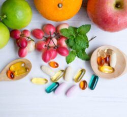 There are many different types of fruits and vegetables on the table.