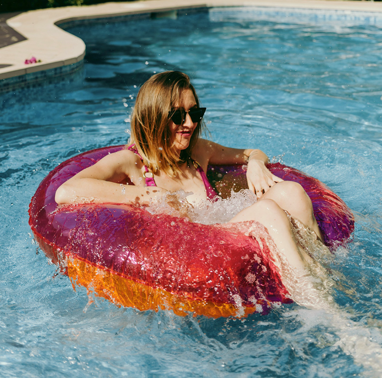 Escaping heat by outdoor pool of Harvest hotel