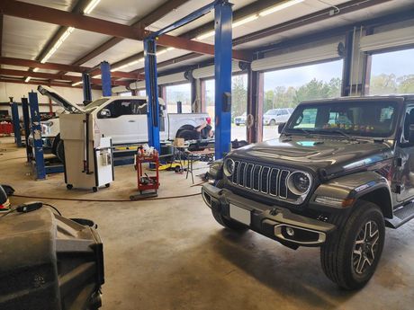 Vehicles at the auto repair shop | Carthage Service Center & Tires