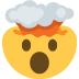 Exploding head emoji with shocked expression, yellow face, dark brown mouth, gray cloud.