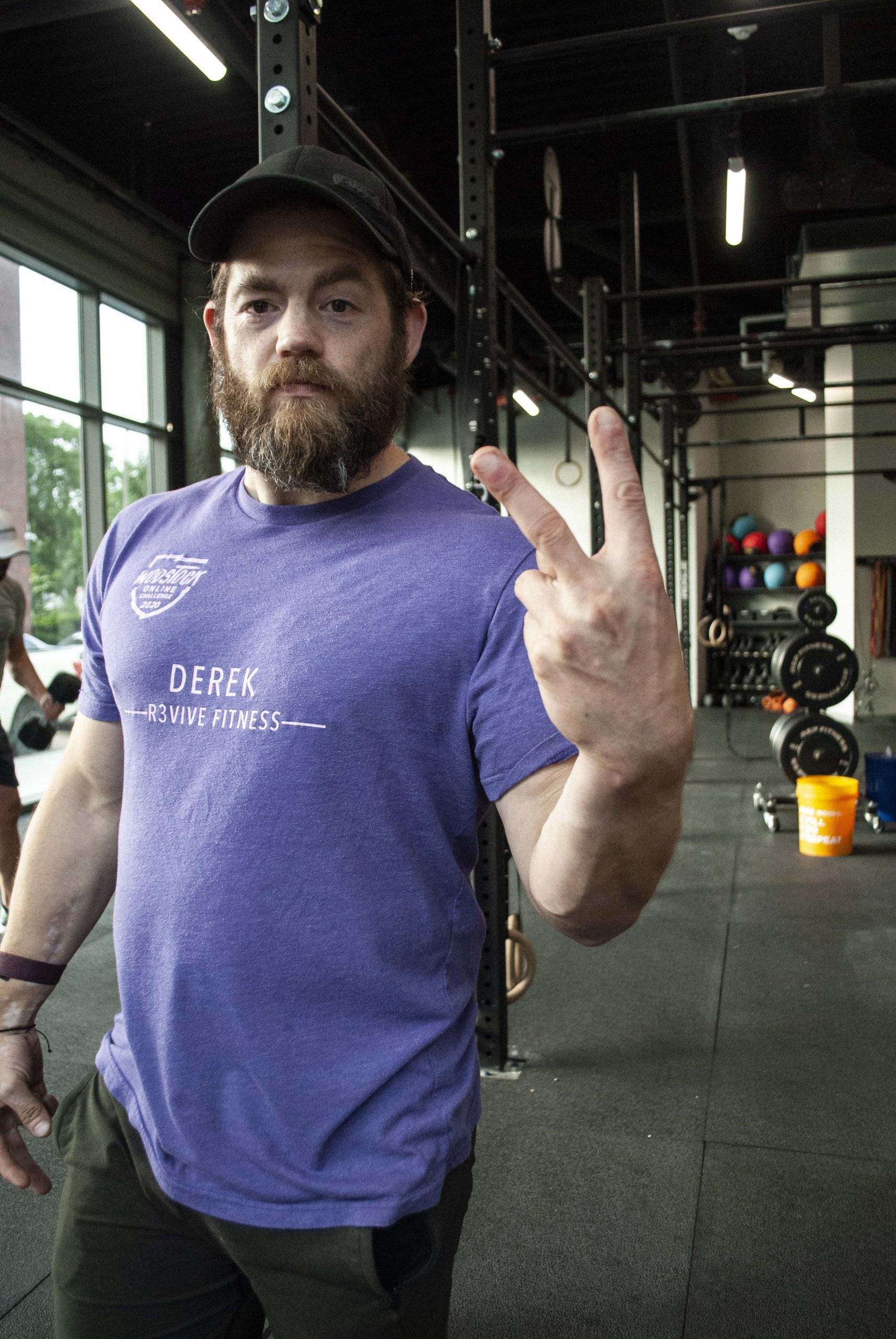 Coach Derek giving you the peace sign