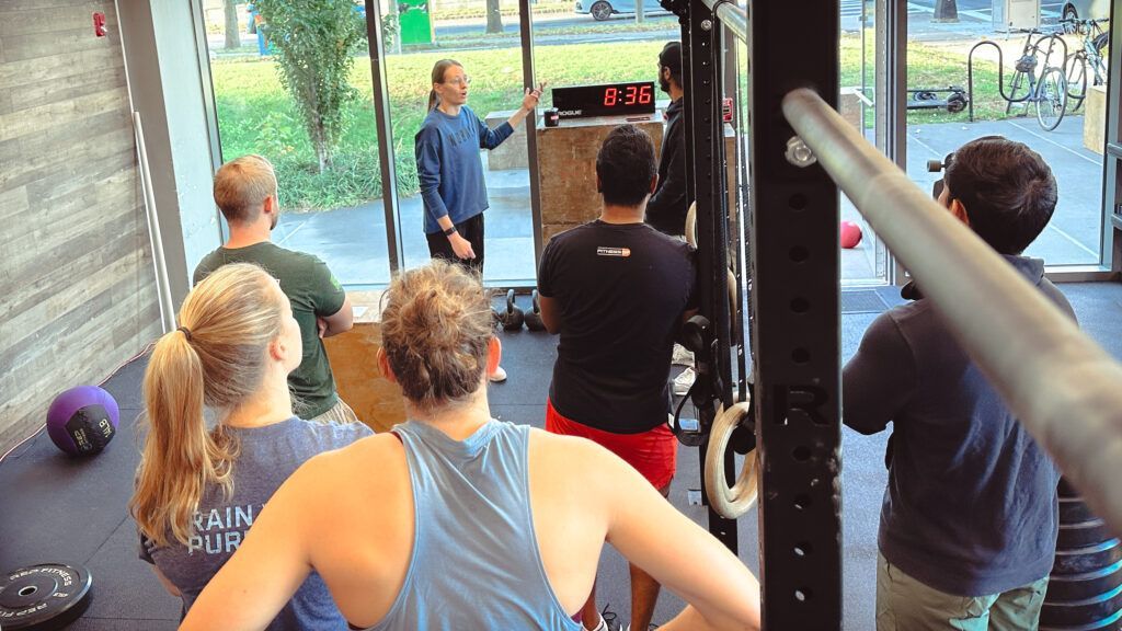 Members receiving instructions for the in-house throw down.
