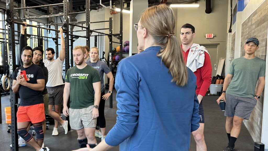 A coach giving out workout instructions