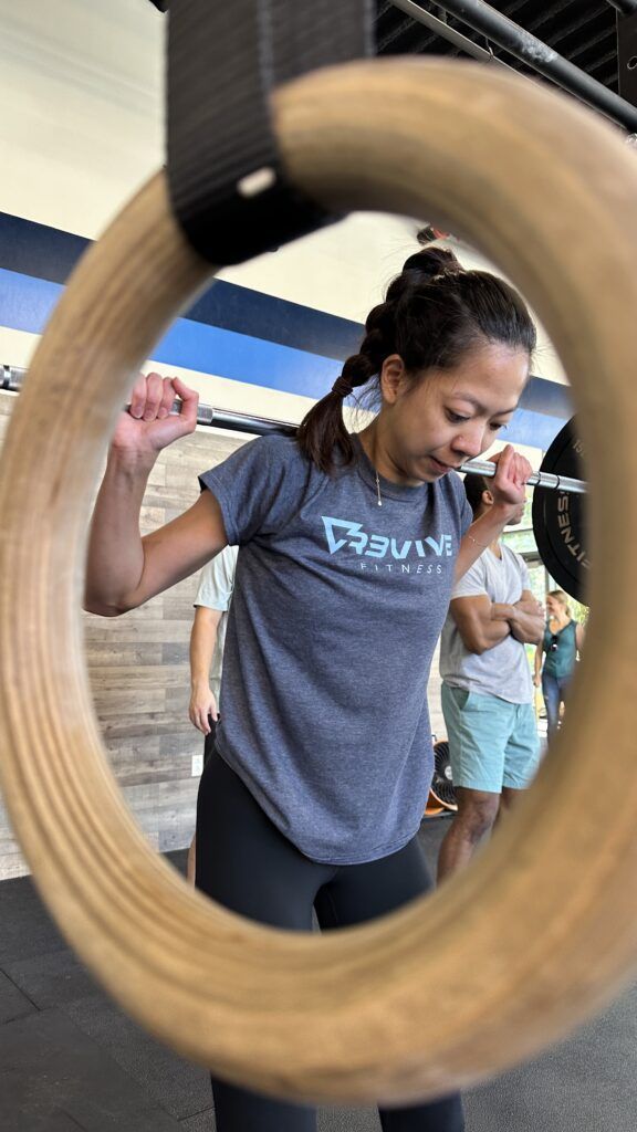 A member setting up to perform a back squat.