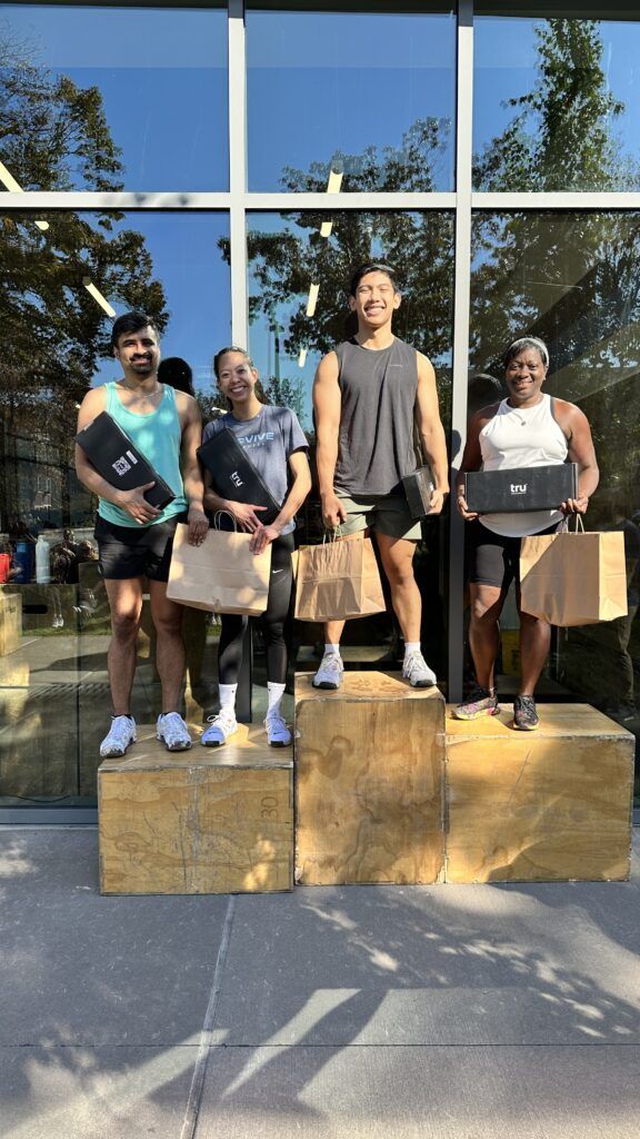 A group of members celebrating their wins at our in-house throw down competition.