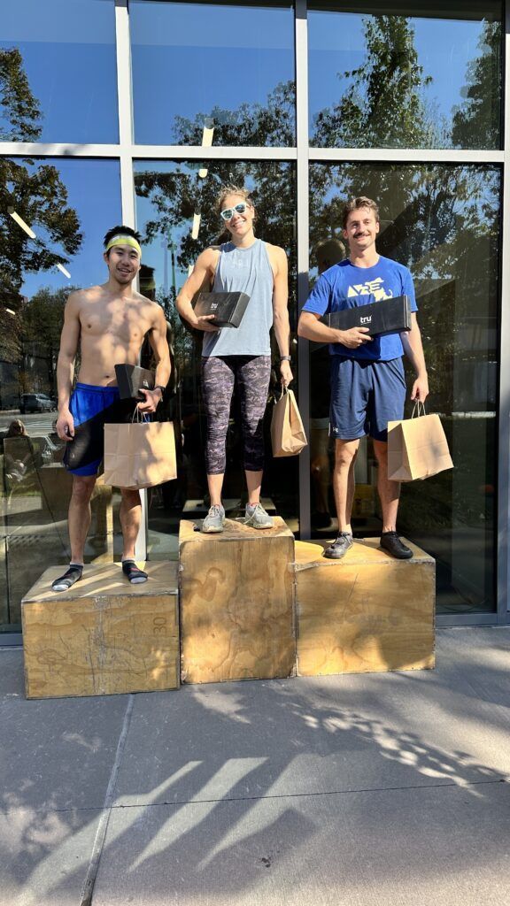 A group of members celebrating their wins at our in-house throw down competition.