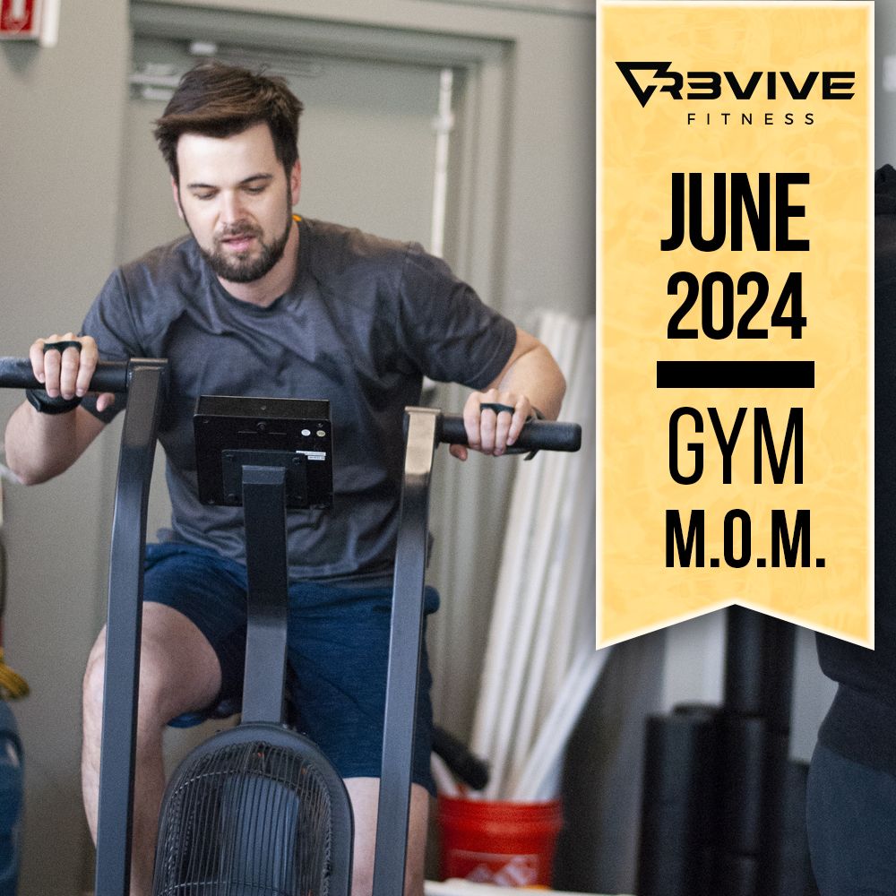 Man on stationary bike at the gym, promoting