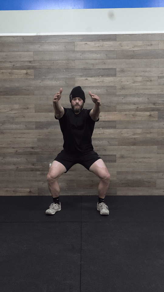 Knees Driving out over toes as you descent into a squat
