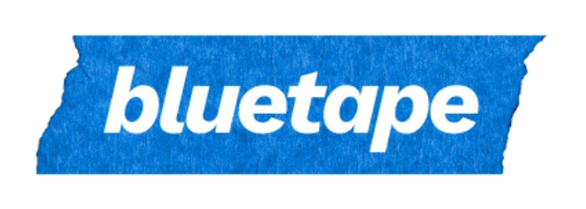 Blue rectangular piece of blue painter's tape with the word