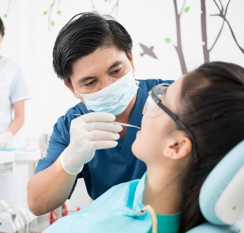 Woman visits practice in Honolulu, HI for cosmetic dentistry services