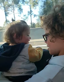 little girl sitting in a bus