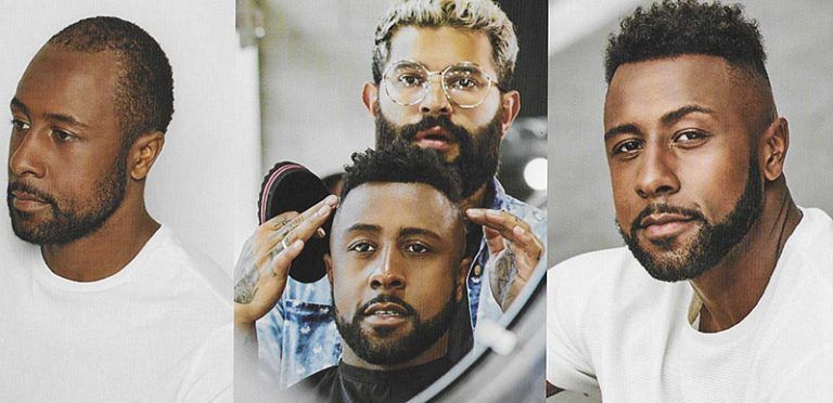 Three men with beards are getting their hair cut by a barber.