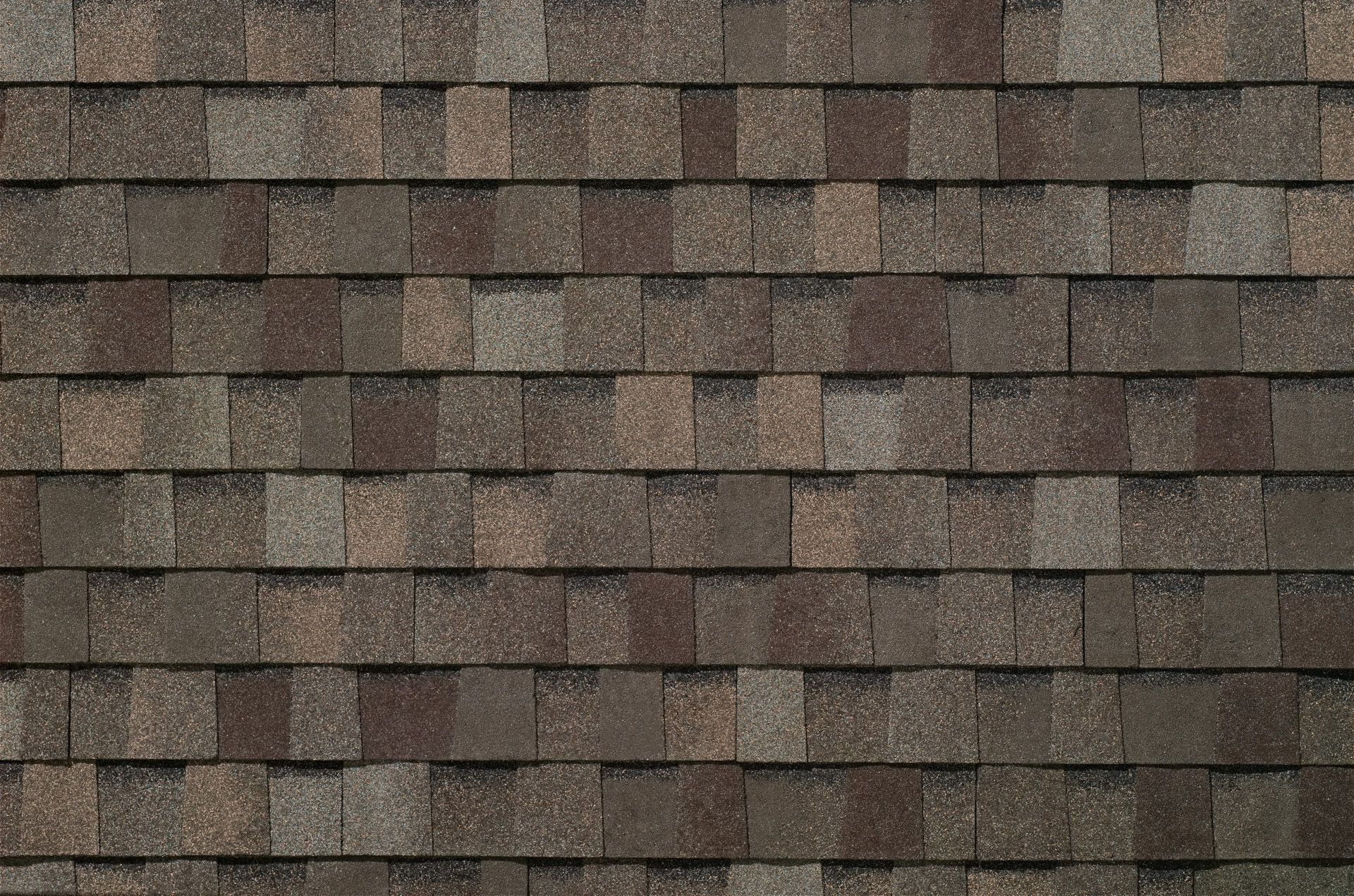 A close up of a roof with shingles on it