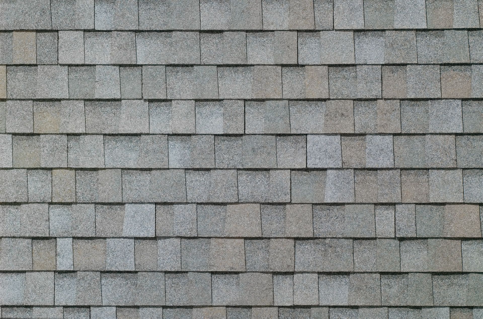 A close up of a roof with shingles on it.