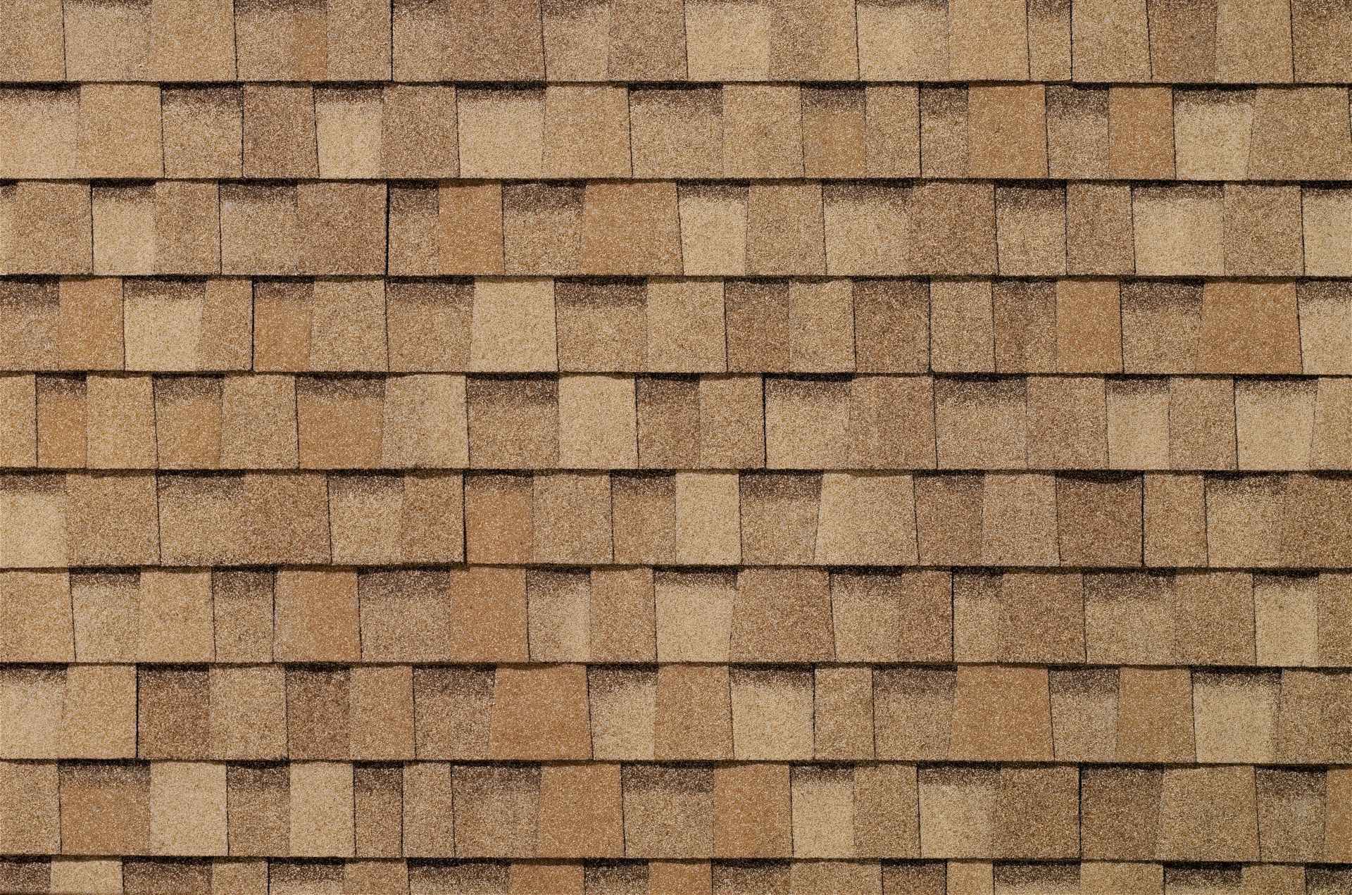 A close up of a roof with shingles on it.